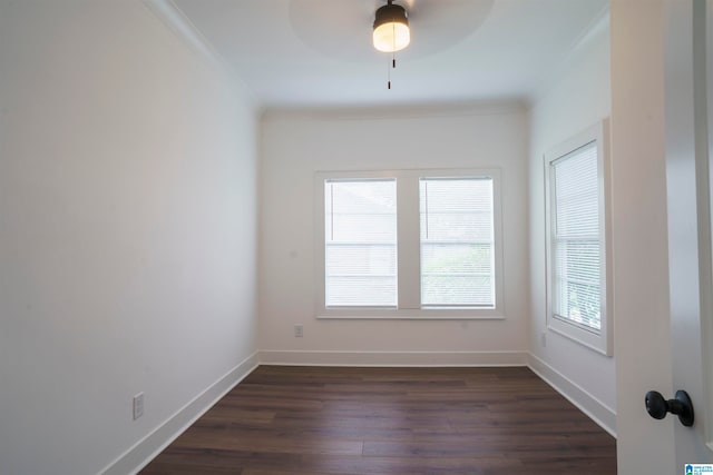 unfurnished room featuring ornamental molding, dark hardwood / wood-style floors, and ceiling fan