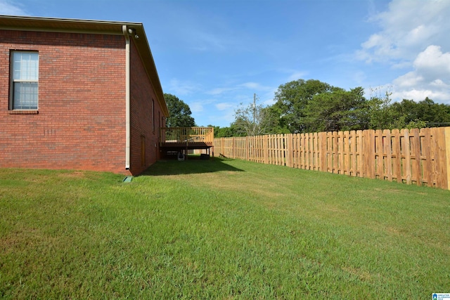 view of yard featuring a deck