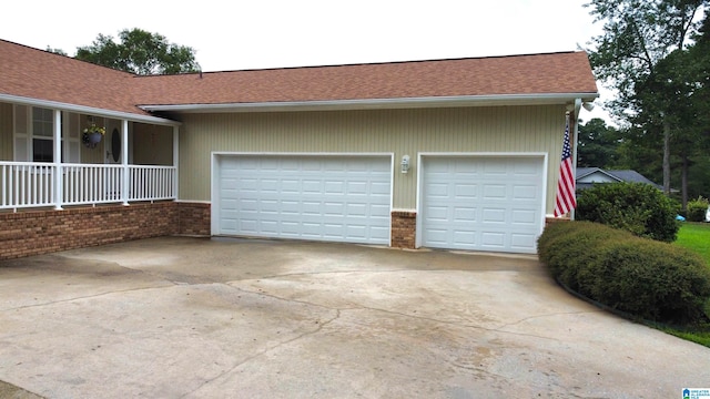 view of side of property featuring a garage