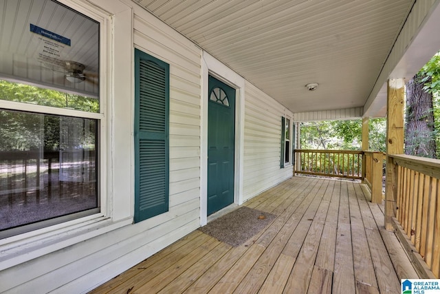 wooden terrace with a porch