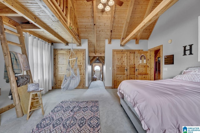 bedroom with multiple windows, wood ceiling, light colored carpet, and beamed ceiling