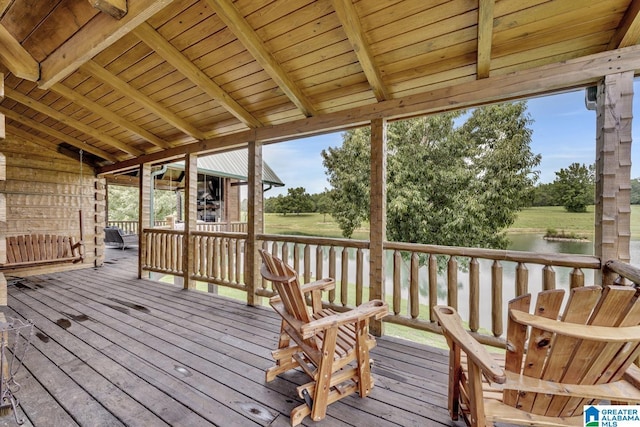 deck featuring a water view