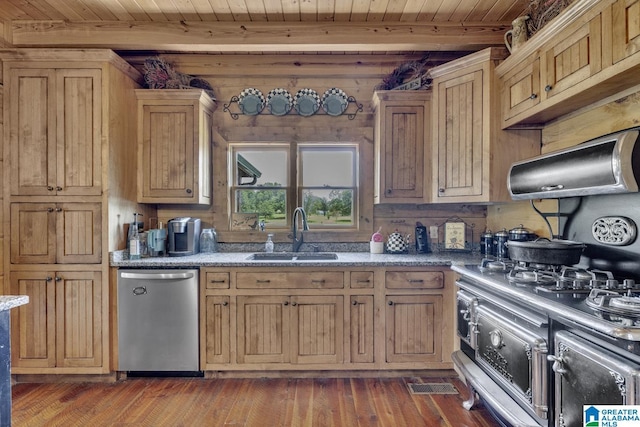 kitchen featuring dark wood-type flooring, sink, stone countertops, stainless steel dishwasher, and beamed ceiling