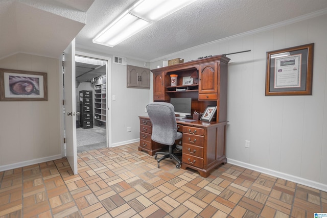 office space with crown molding and a textured ceiling