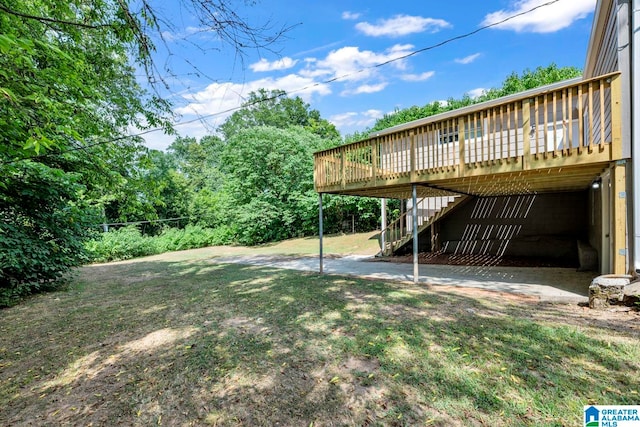 view of yard with a deck