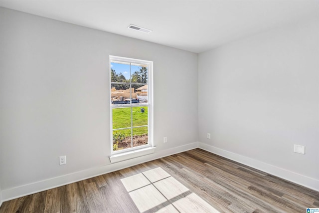 unfurnished room with plenty of natural light and light wood-type flooring