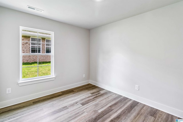 empty room with light wood-type flooring