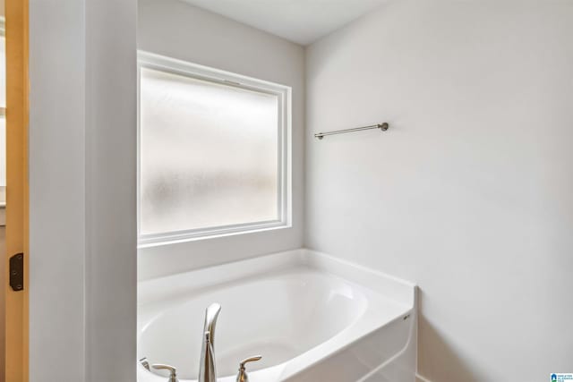 bathroom featuring a tub