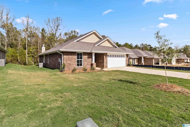 view of front of house featuring a garage and a front yard