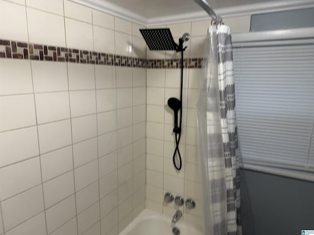 bathroom with shower / bath combination with curtain