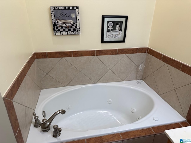 bathroom with tiled bath