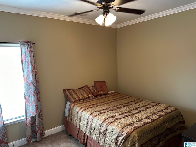 bedroom with crown molding, ceiling fan, and carpet flooring