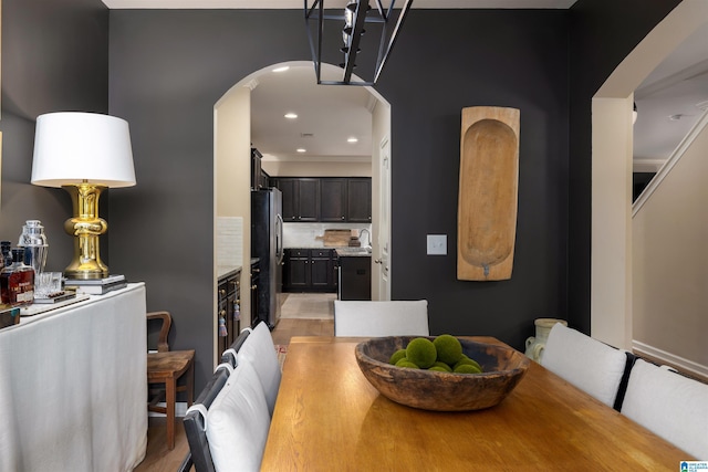 dining room featuring sink