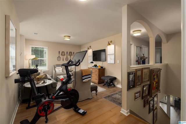 workout area featuring light hardwood / wood-style flooring