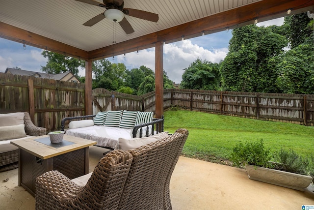 view of patio / terrace with an outdoor living space and ceiling fan