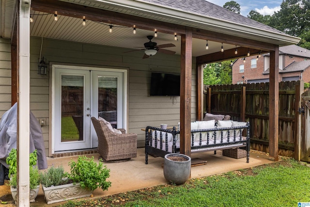 view of patio featuring french doors, ceiling fan, and an outdoor living space