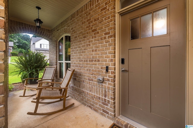 property entrance featuring covered porch