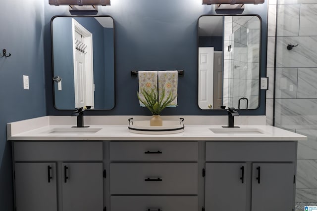 bathroom with vanity and an enclosed shower