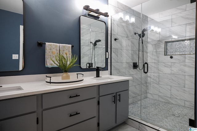 bathroom featuring vanity and a shower with shower door