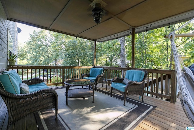 wooden deck with an outdoor hangout area