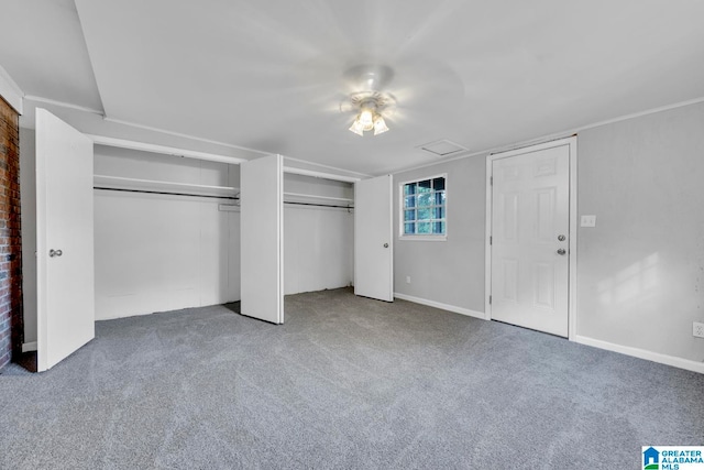 unfurnished bedroom featuring carpet flooring and ceiling fan