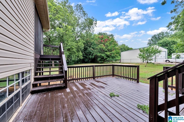 wooden terrace with a yard