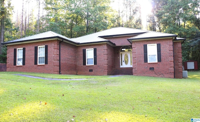 ranch-style home featuring crawl space, a front lawn, and brick siding