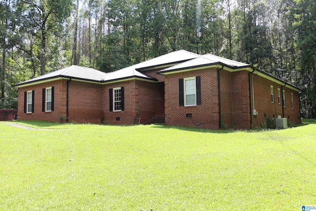 ranch-style house with crawl space, a front yard, and brick siding