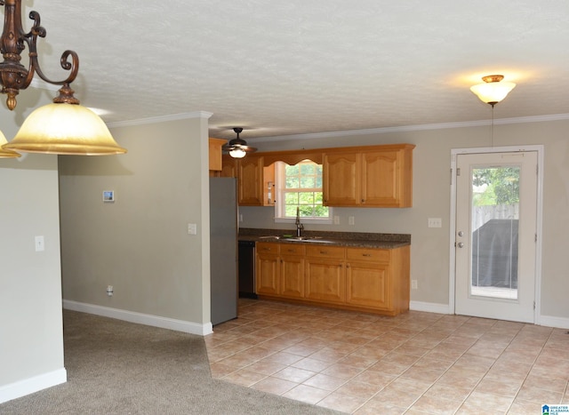 kitchen with crown molding, dishwashing machine, sink, and light tile patterned floors