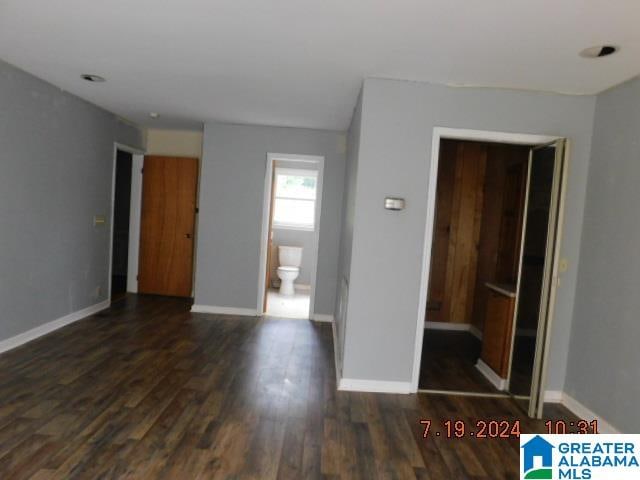 interior space with dark hardwood / wood-style flooring