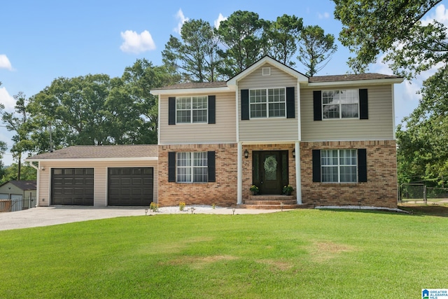 view of front facade with a front lawn and a garage