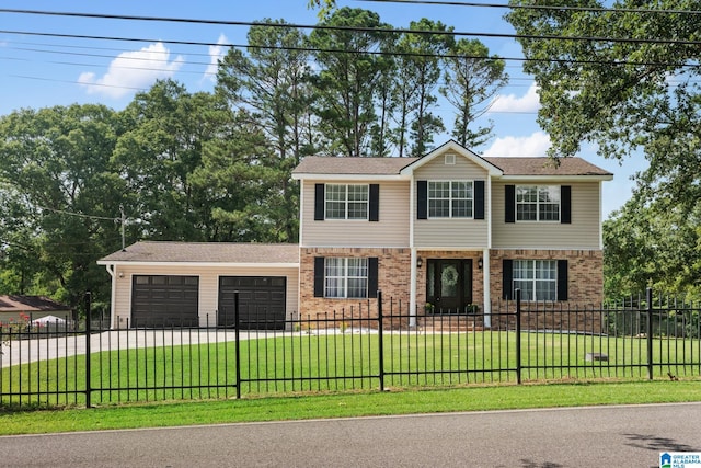 view of front of property with a garage and a front lawn