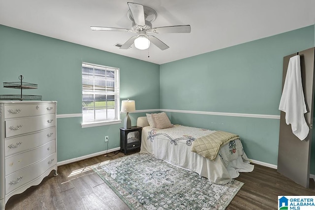 bedroom featuring ceiling fan and hardwood / wood-style floors