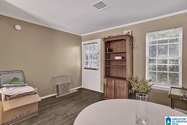 interior space featuring wood-type flooring and ornamental molding