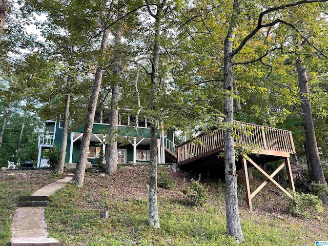 view of front of property featuring a wooden deck