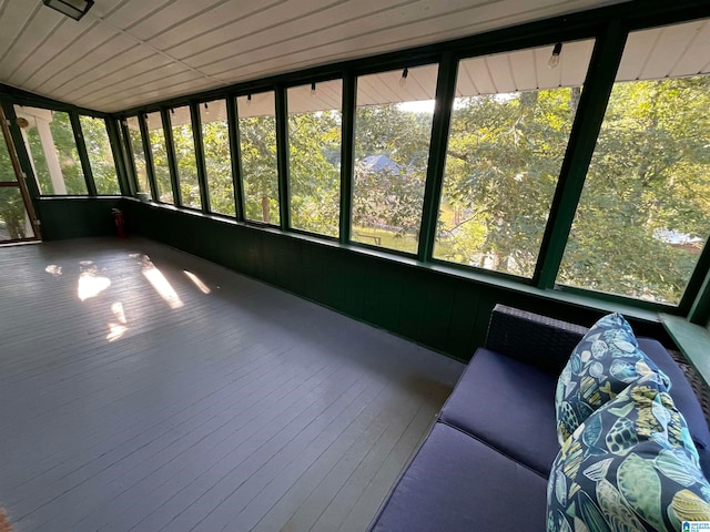 unfurnished sunroom with a healthy amount of sunlight