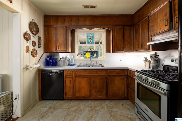 kitchen with light tile patterned flooring, sink, black dishwasher, and gas stove