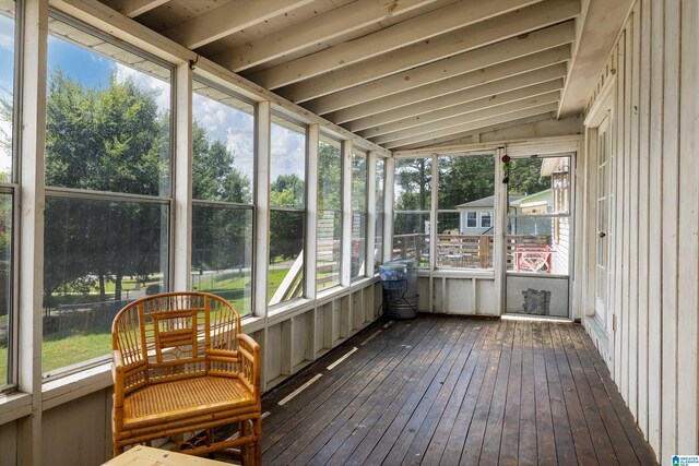 sunroom / solarium with lofted ceiling