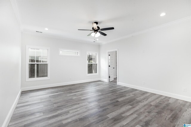 unfurnished living room featuring crown molding, ceiling fan, and wood-type flooring