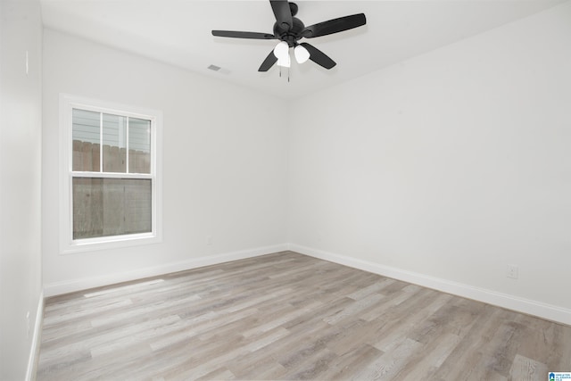 unfurnished room featuring ceiling fan and light hardwood / wood-style flooring