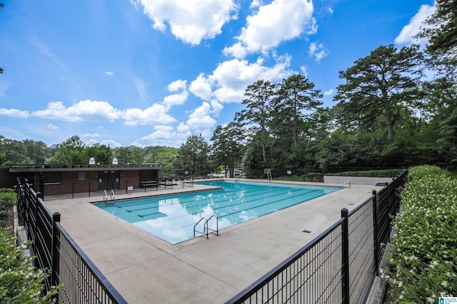 view of swimming pool featuring a patio