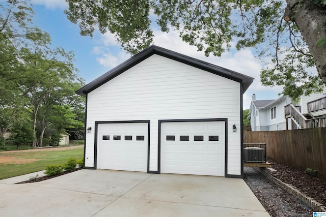 garage with a lawn