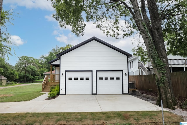 garage with a yard