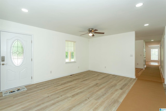 entryway featuring light hardwood / wood-style flooring and ceiling fan