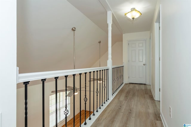 hall with light hardwood / wood-style flooring