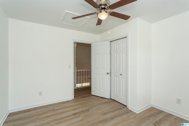 unfurnished bedroom with a closet, ceiling fan, and light wood-type flooring