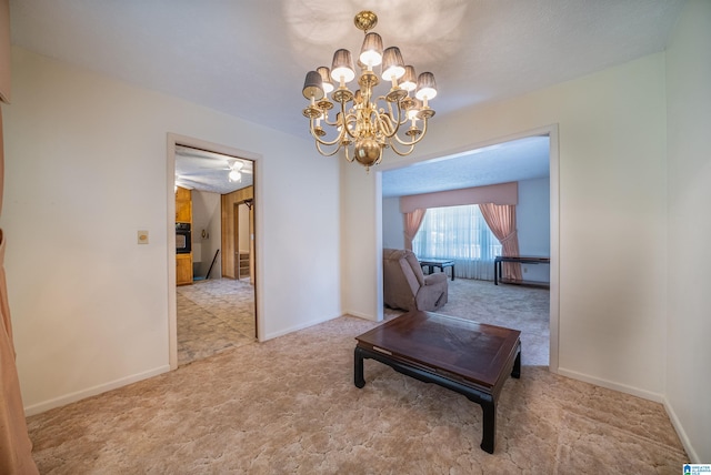 dining area with an inviting chandelier