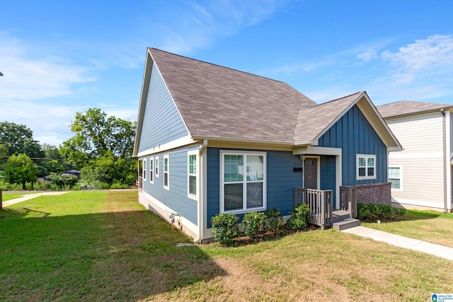 view of front of home with a front yard