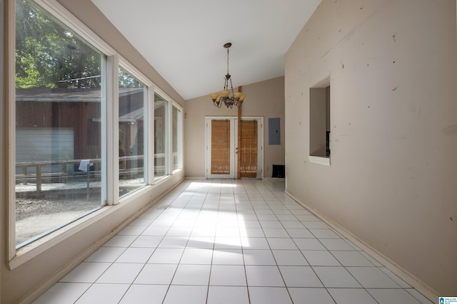 unfurnished sunroom featuring an inviting chandelier, lofted ceiling, and electric panel