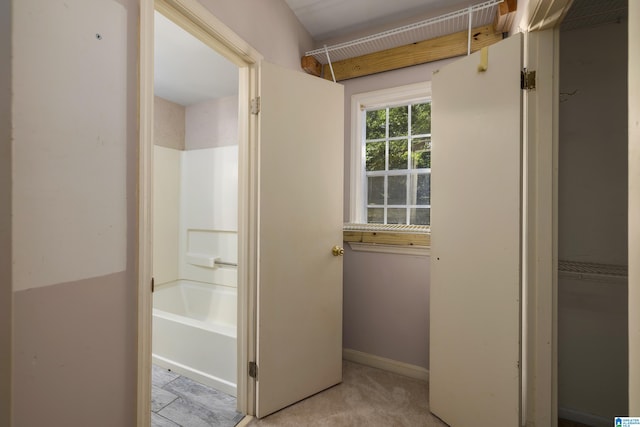 bathroom with tile patterned floors